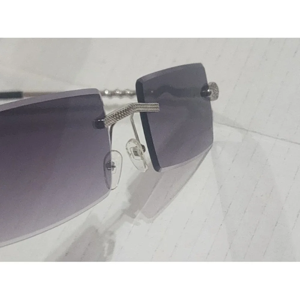 Womens silver snake embellished rimless fashionable sunglasses uv protection